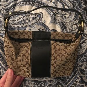 Small, brown Coach handbag